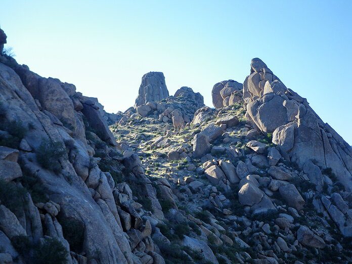 scrambling up to Tom's Thumb
