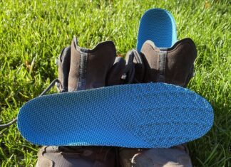 Are Cushifix Hiking Insoles Worth Buying? pair of cushifix insoles sitting on a pair of hiking boots
