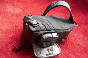 Lowepro backpack with a canon camera inside