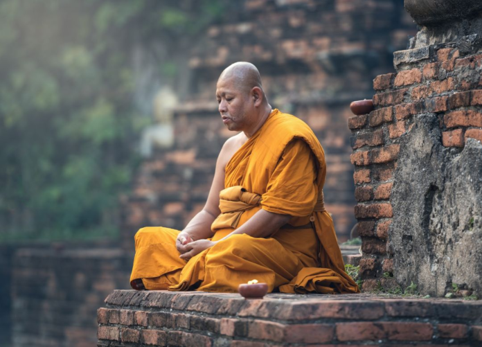 Buddhist monk, courtesy to Canva