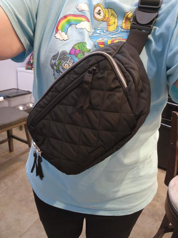 Vera Bradley large belt bag worn as a chest bag